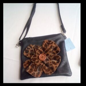 SEPARATE black handbag